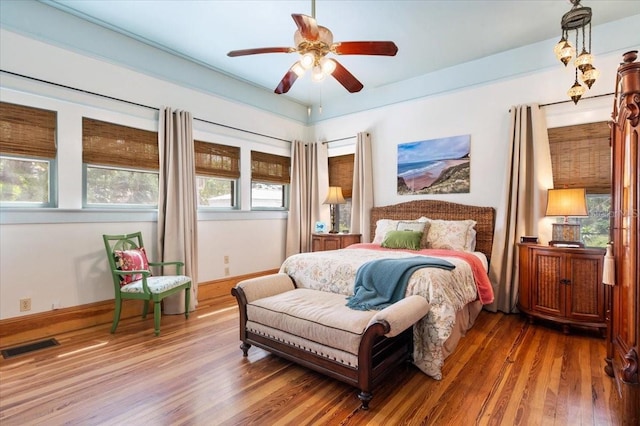 2326 2nd Ave E, Bradenton, FL 34208 - bedroom with wood finished floors, baseboards, and a ceiling fan