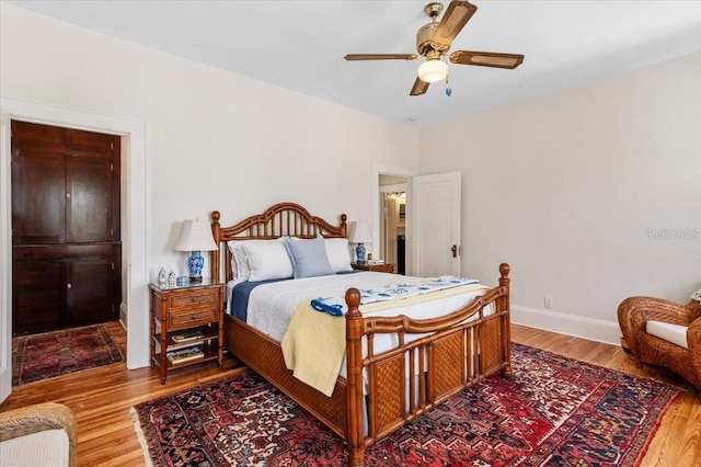 2326 2nd Ave E, Bradenton, FL 34208 - bedroom featuring wood finished floors, baseboards, and ceiling fan