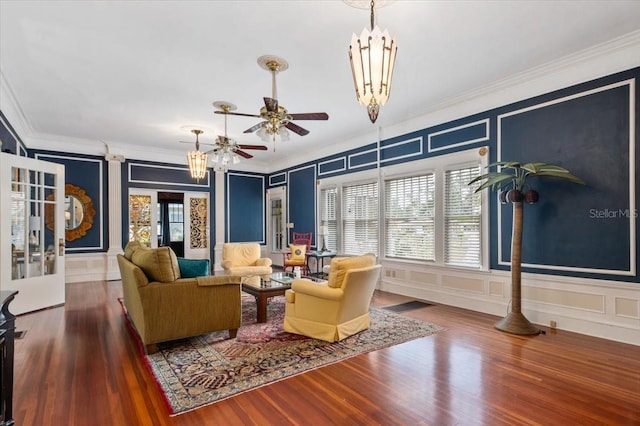 2326 2nd Ave E, Bradenton, FL 34208 - living area featuring a decorative wall, ornamental molding, ceiling fan, and wood finished floors