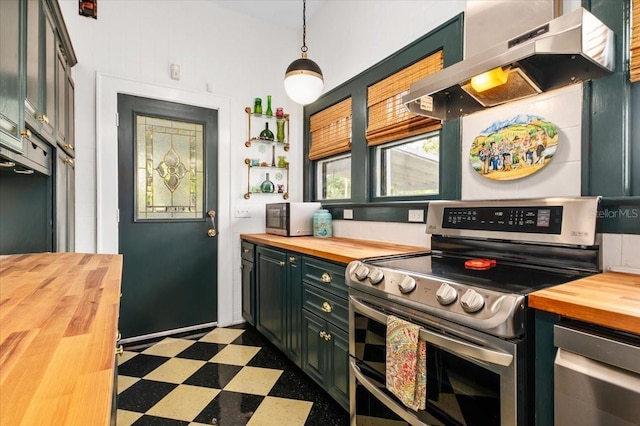 2326 2nd Ave E, Bradenton, FL 34208 - kitchen with wooden counters, stainless steel appliances, under cabinet range hood, and dark floors