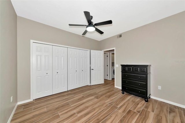 1712 Starling Dr Unit 101, Sarasota, FL 34231 - unfurnished bedroom with light wood-style floors, baseboards, visible vents, and a closet