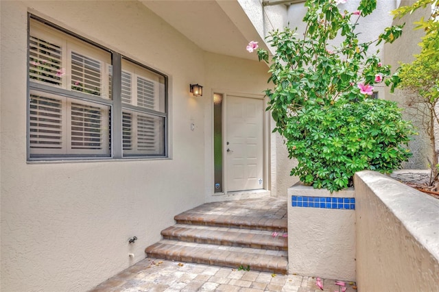 1712 Starling Dr Unit 101, Sarasota, FL 34231 - entrance to property featuring stucco siding