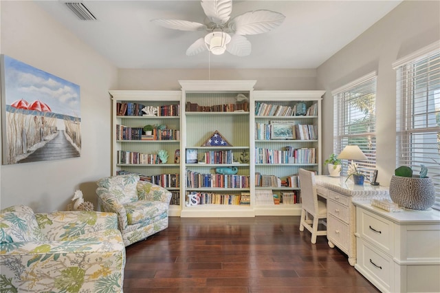 6936 White Willow Ct, Sarasota, FL 34243 - sitting room with visible vents, ceiling fan, and wood finished floors
