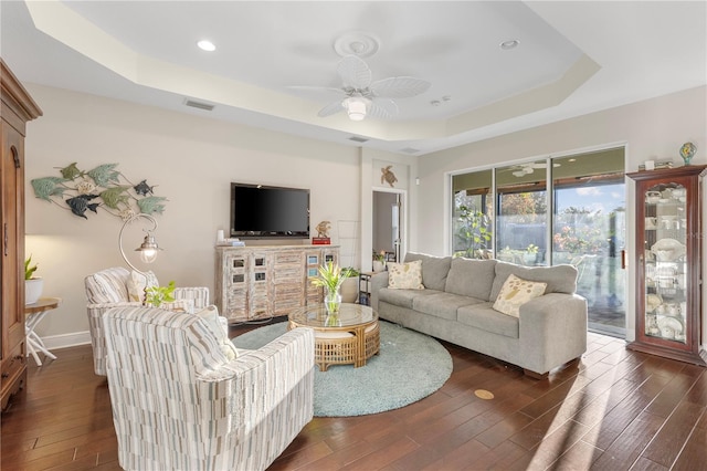 6936 White Willow Ct, Sarasota, FL 34243 - living area featuring dark wood-style flooring, recessed lighting, a ceiling fan, visible vents, and a tray ceiling