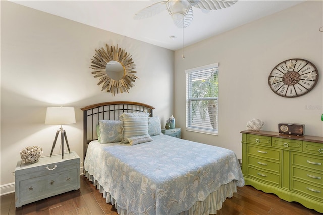 6936 White Willow Ct, Sarasota, FL 34243 - bedroom with dark wood-type flooring, ceiling fan, and baseboards