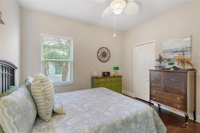 6936 White Willow Ct, Sarasota, FL 34243 - bedroom featuring baseboards, a ceiling fan, and wood finished floors