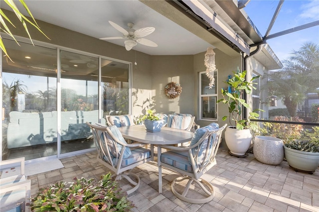 6936 White Willow Ct, Sarasota, FL 34243 - sunroom / solarium featuring an outdoor hangout area and a ceiling fan