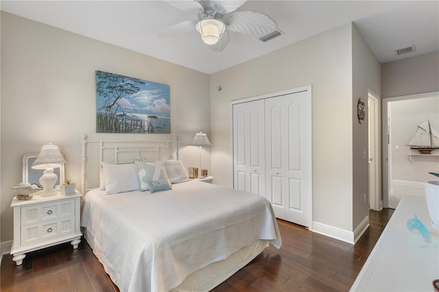 6936 White Willow Ct, Sarasota, FL 34243 - bedroom with baseboards, a closet, wood-type flooring, and visible vents