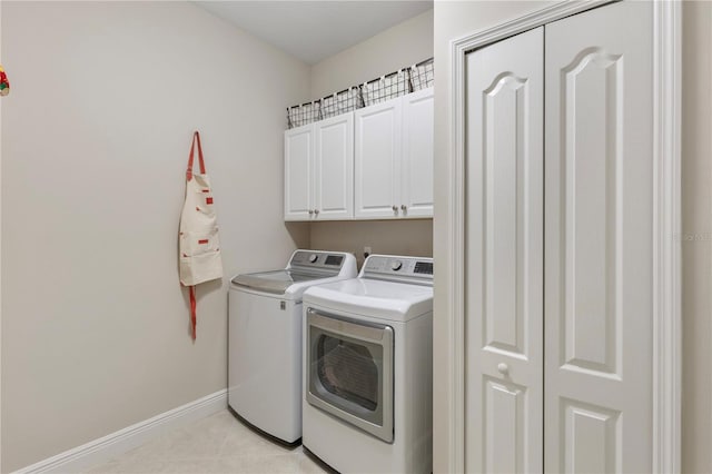6936 White Willow Ct, Sarasota, FL 34243 - laundry room featuring light tile patterned floors, baseboards, cabinet space, and washing machine and dryer