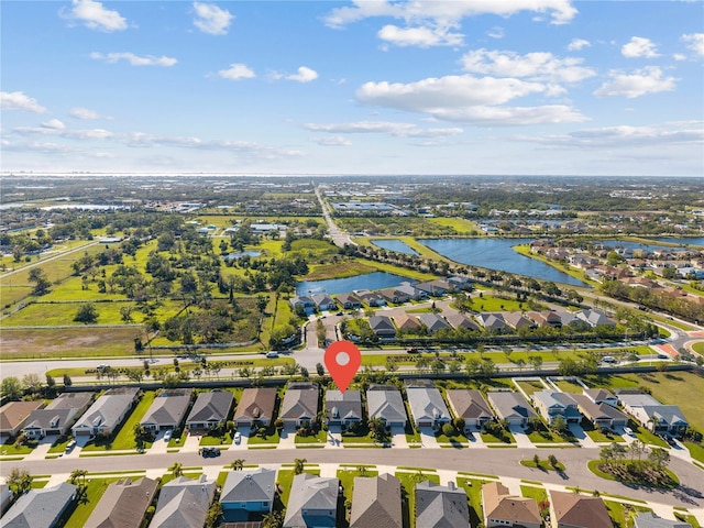 6936 White Willow Ct, Sarasota, FL 34243 - bird's eye view featuring a water view and a residential view