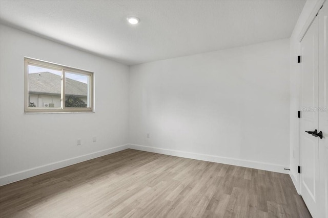 2881 48th Way E, Bradenton, FL 34203 - spare room featuring light wood-style floors and baseboards
