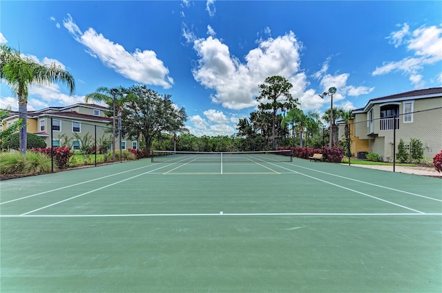 view of sport court with community basketball court and fence