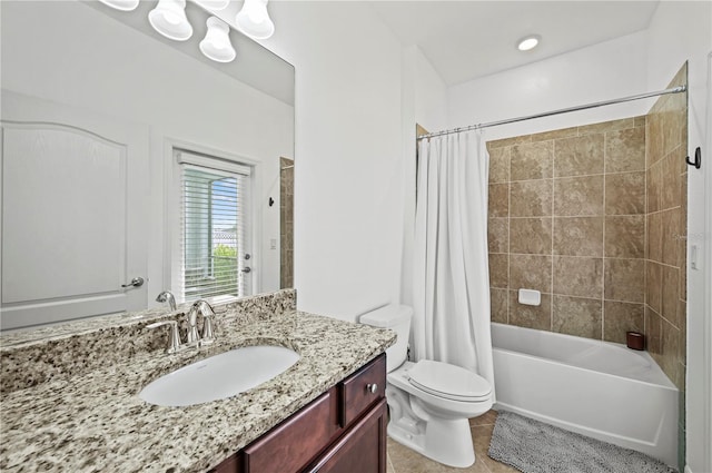 bathroom with shower / tub combo, toilet, vanity, and tile patterned flooring