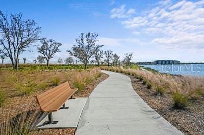 view of home's community featuring a water view