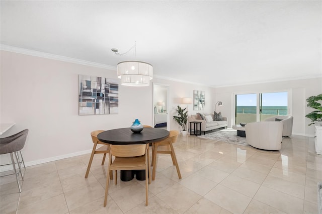 1750 Benjamin Franklin Dr Unit 6B, Sarasota, FL 34236 - dining area featuring crown molding and light tile patterned floors