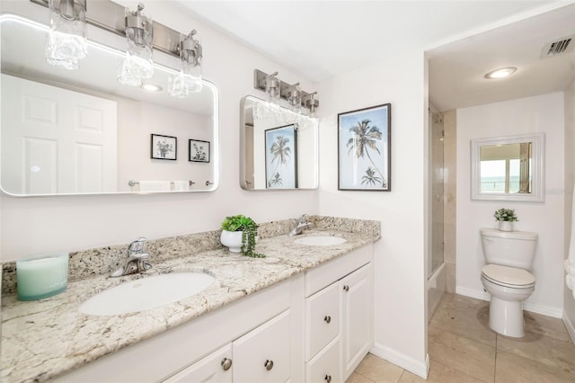 1750 Benjamin Franklin Dr Unit 6B, Sarasota, FL 34236 - full bathroom featuring double vanity, tile patterned flooring, and shower / bath combination with glass door