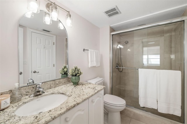 1750 Benjamin Franklin Dr Unit 6B, Sarasota, FL 34236 - bathroom featuring vanity, a shower stall, and tile patterned flooring