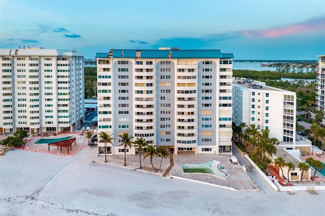 1750 Benjamin Franklin Dr Unit 6B, Sarasota, FL 34236 - view of building exterior featuring a water view