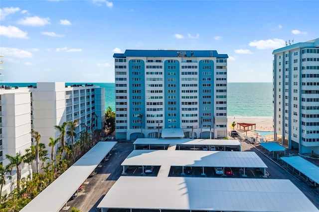 1750 Benjamin Franklin Dr Unit 6B, Sarasota, FL 34236 - view of building exterior with a water view