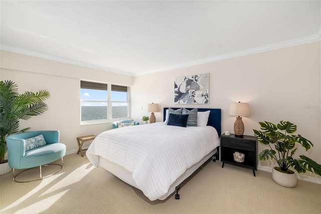 1750 Benjamin Franklin Dr Unit 6B, Sarasota, FL 34236 - bedroom featuring crown molding and light carpet