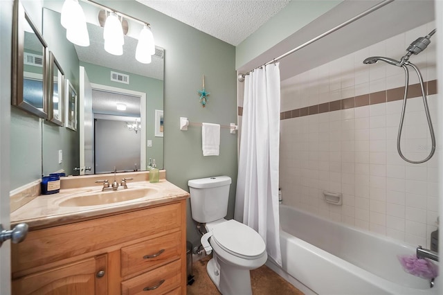 6033 34th St W Unit 132, Bradenton, FL 34210 - bathroom featuring a textured ceiling, vanity, shower / bath combo with shower curtain, and toilet