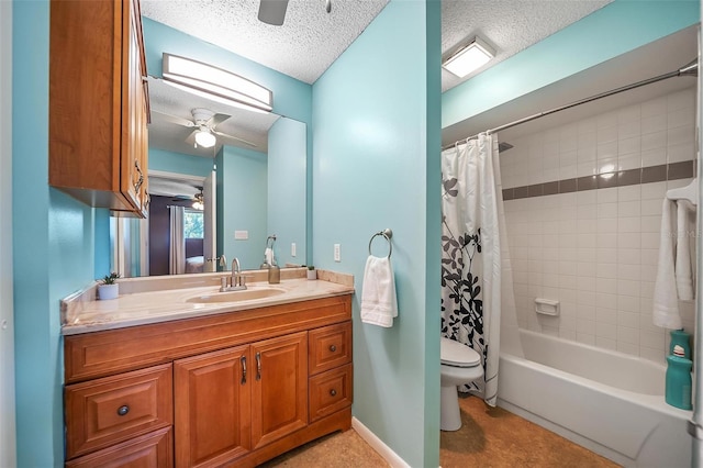 6033 34th St W Unit 132, Bradenton, FL 34210 - full bathroom featuring ceiling fan, a textured ceiling, toilet, vanity, and shower / bath combo with shower curtain