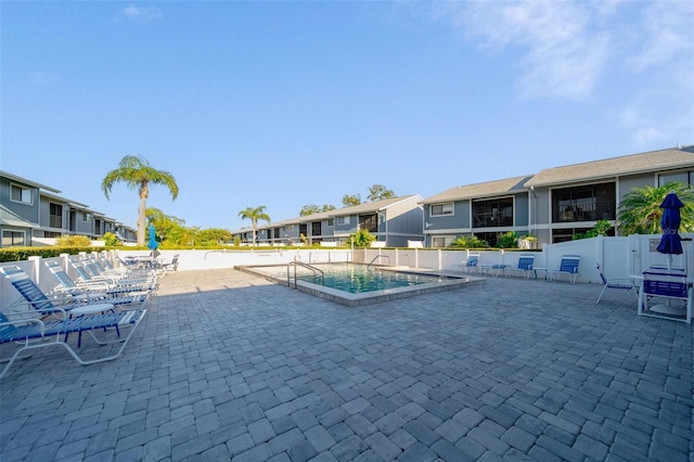 6033 34th St W Unit 132, Bradenton, FL 34210 - community pool featuring a patio and fence