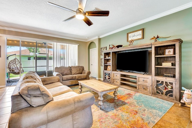 6729 45th Ter E, Bradenton, FL 34203 - living area featuring ornamental molding, a ceiling fan, arched walkways, and a textured ceiling