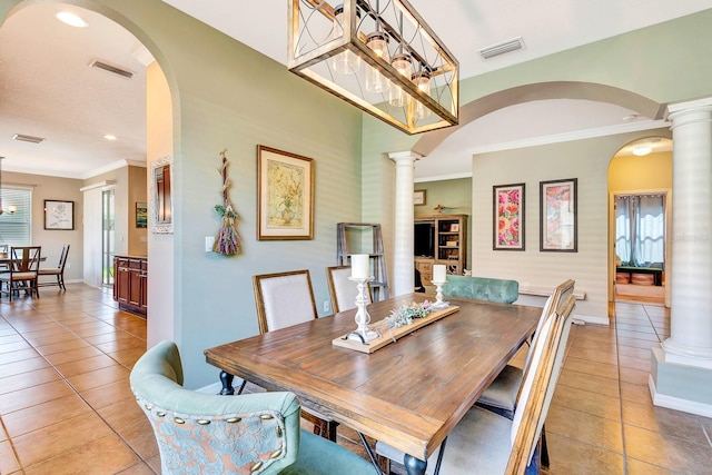 6729 45th Ter E, Bradenton, FL 34203 - dining area featuring arched walkways, light tile patterned floors, visible vents, and ornate columns