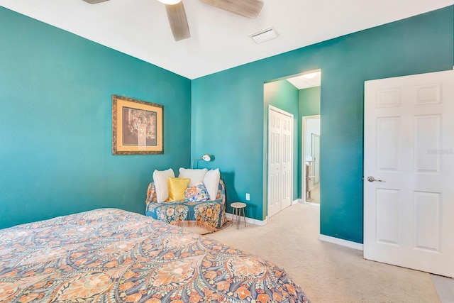 6729 45th Ter E, Bradenton, FL 34203 - carpeted bedroom with a closet, ceiling fan, baseboards, and visible vents