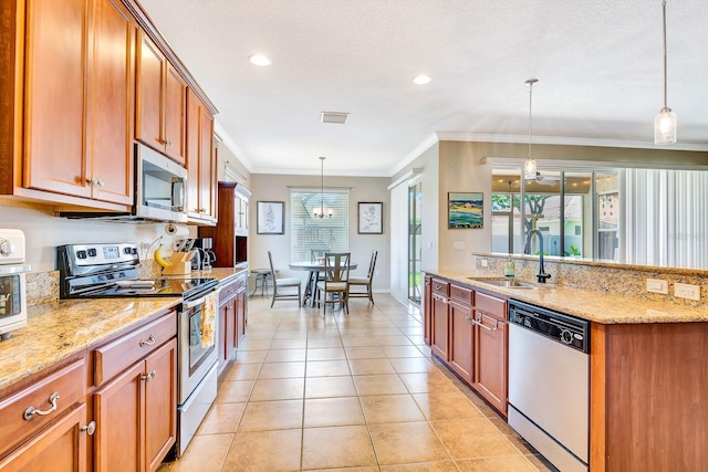 6729 45th Ter E, Bradenton, FL 34203 - kitchen featuring light tile patterned floors, a sink, ornamental molding, stainless steel appliances, and light stone counters