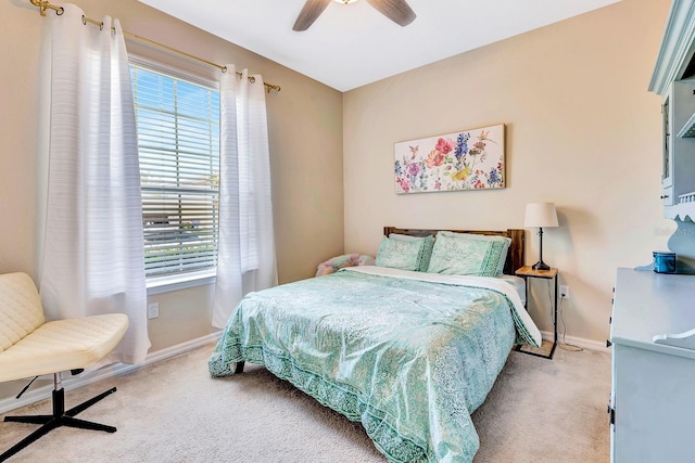 6729 45th Ter E, Bradenton, FL 34203 - carpeted bedroom featuring multiple windows, baseboards, and a ceiling fan