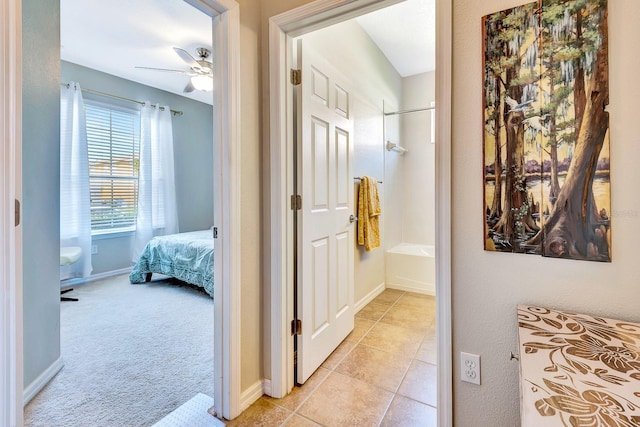 6729 45th Ter E, Bradenton, FL 34203 - corridor with light tile patterned floors and baseboards