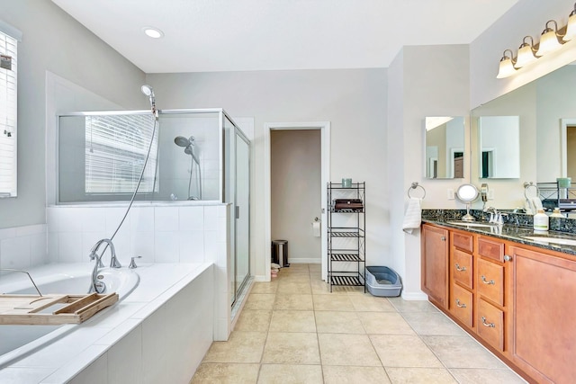 6729 45th Ter E, Bradenton, FL 34203 - bathroom with tile patterned flooring, vanity, a bath, and a stall shower