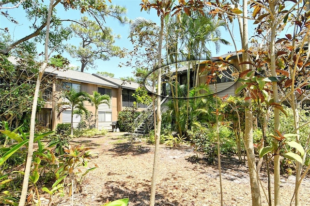 view of yard with stairs