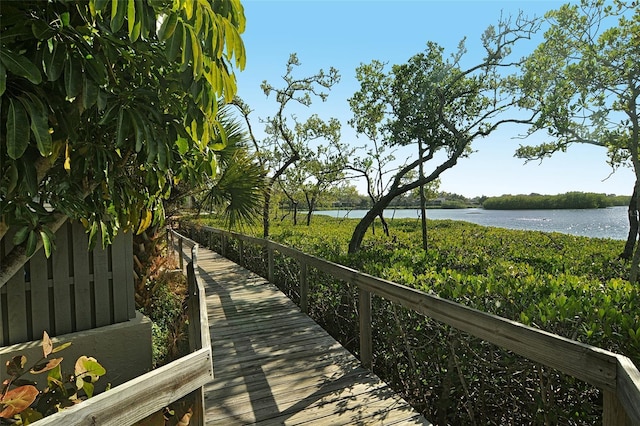 surrounding community with a water view