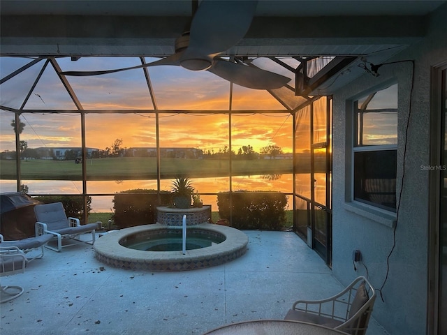 1322 Millbrook Cir, Bradenton, FL 34212 - patio terrace at dusk with a lanai, a water view, and an in ground hot tub