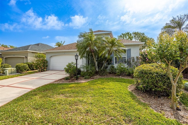 1322 Millbrook Cir, Bradenton, FL 34212 - ranch-style house with stucco siding, an attached garage, driveway, and a front lawn