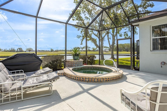 1322 Millbrook Cir, Bradenton, FL 34212 - view of patio featuring glass enclosure, an in ground hot tub, and a water view
