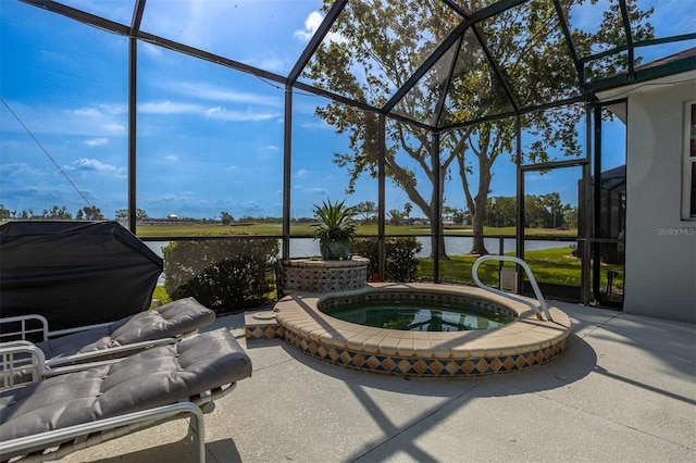 1322 Millbrook Cir, Bradenton, FL 34212 - view of patio / terrace with area for grilling, a lanai, a water view, and an in ground hot tub