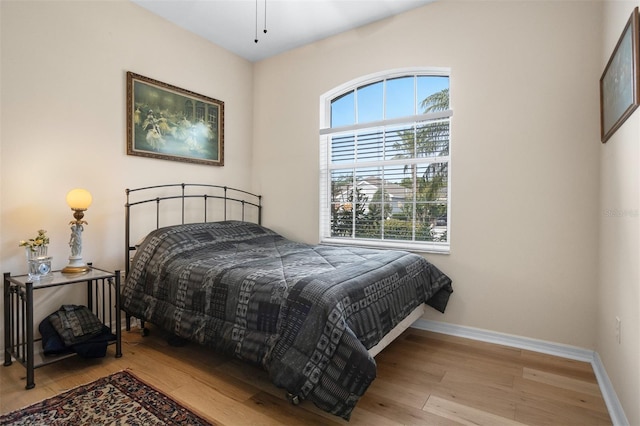 1322 Millbrook Cir, Bradenton, FL 34212 - bedroom with baseboards and wood finished floors