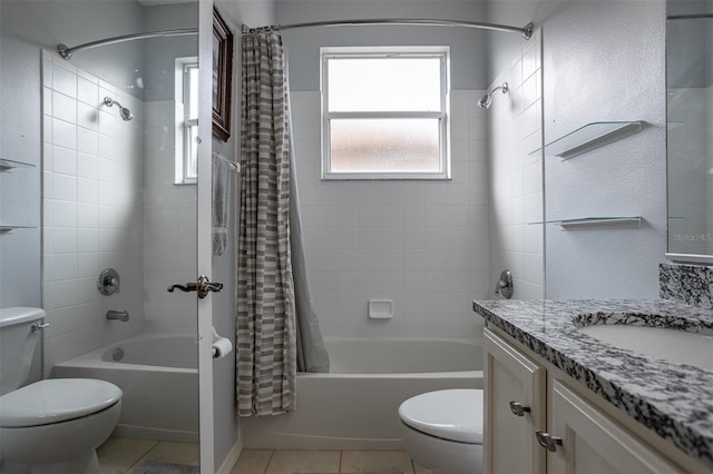 1322 Millbrook Cir, Bradenton, FL 34212 - bathroom with vanity, toilet, tile patterned flooring, and shower / bath combo with shower curtain