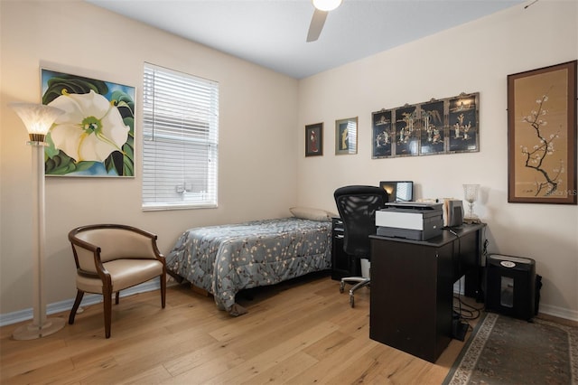 1322 Millbrook Cir, Bradenton, FL 34212 - bedroom featuring baseboards, a ceiling fan, and wood finished floors