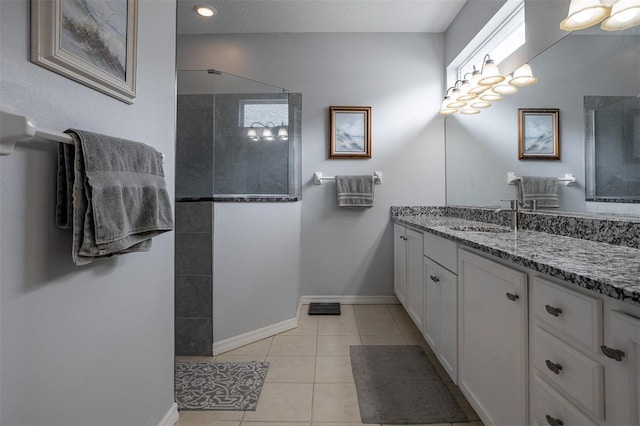 1322 Millbrook Cir, Bradenton, FL 34212 - full bathroom featuring vanity, walk in shower, a healthy amount of sunlight, baseboards, and tile patterned flooring