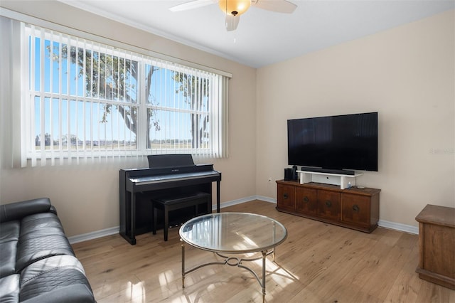 1322 Millbrook Cir, Bradenton, FL 34212 - living room featuring wood finished floors, a ceiling fan, and baseboards