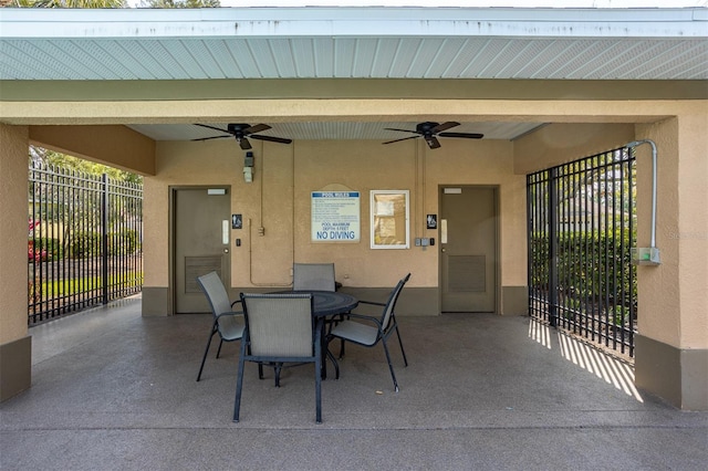 1322 Millbrook Cir, Bradenton, FL 34212 - view of patio with outdoor dining area, ceiling fan, and fence