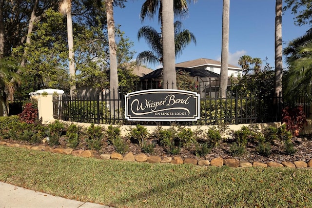 community sign with fence