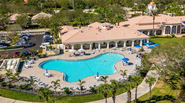 community pool with a patio