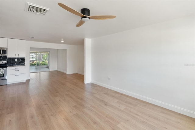 unfurnished living room with visible vents, baseboards, a ceiling fan, and light wood-style flooring