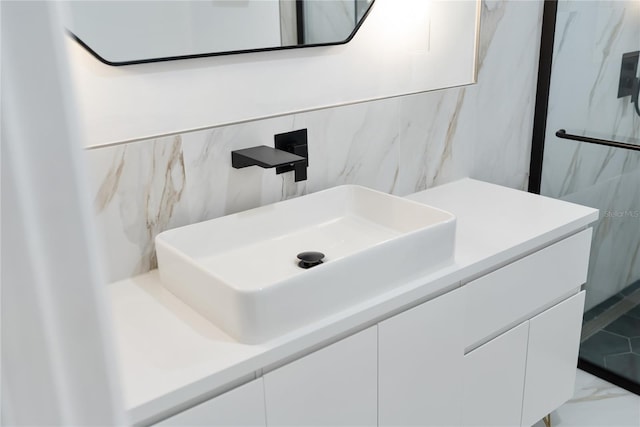 bathroom with tile walls and vanity
